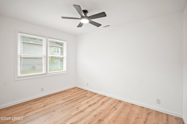1117 Old Trail Rd, Beaufort, SC 29902 - empty room with light wood-type flooring, baseboards, and a ceiling fan
