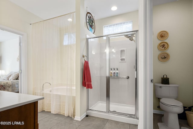 bathroom with toilet, a shower with door, vanity, and tile patterned floors