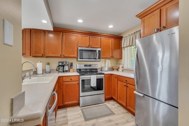 kitchen featuring stainless steel appliances and sink