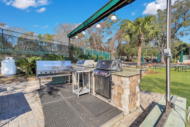 view of patio / terrace featuring area for grilling and exterior kitchen