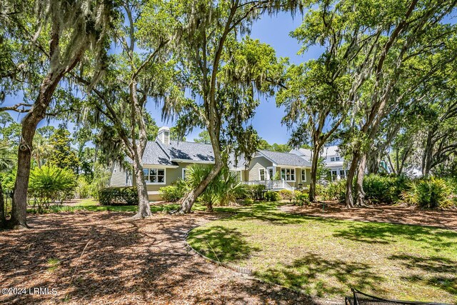 view of yard with covered porch