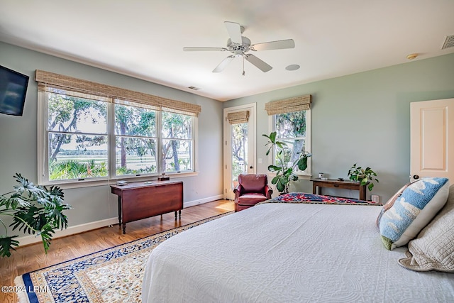 bedroom featuring wood-type flooring and ceiling fan