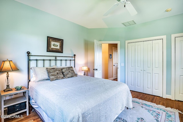 bedroom with hardwood / wood-style floors and ceiling fan