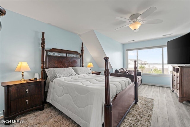 bedroom with light wood-type flooring and ceiling fan