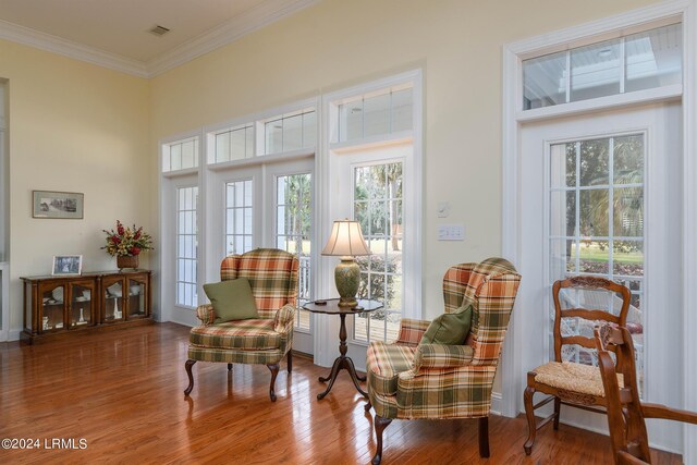 34 Osprey Cir, Okatie, SC 29909 - living area featuring hardwood / wood-style flooring and crown molding