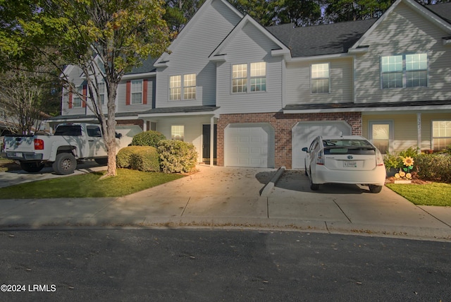 329 S St, Bluffton, SC 29910 - view of front facade with a garage