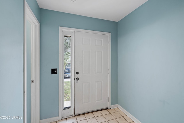 2304 Pine Ct S Unit 1, Beaufort, SC 29902 - foyer entrance with light tile patterned flooring, healthy amount of natural light, and baseboards