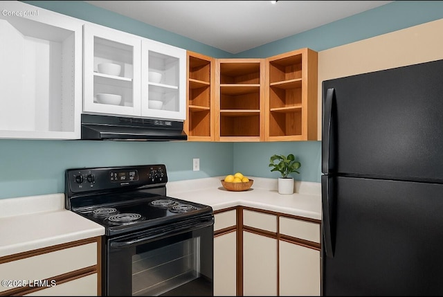 2304 Pine Ct S Unit 1, Beaufort, SC 29902 - kitchen featuring black appliances, under cabinet range hood, white cabinetry, light countertops, and glass insert cabinets
