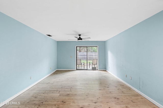 2304 Pine Ct S Unit 1, Beaufort, SC 29902 - empty room featuring a ceiling fan, wood finished floors, and baseboards