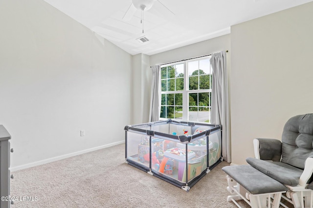 recreation room featuring ceiling fan and carpet