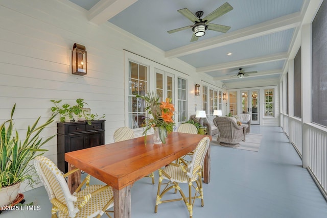 sunroom / solarium with beam ceiling, french doors, and ceiling fan