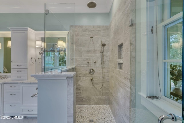 full bathroom with walk in shower and vanity