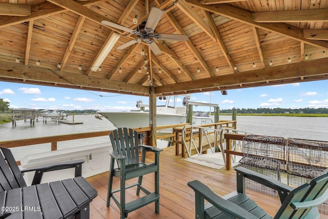 exterior space with a boat dock, a water view, and boat lift