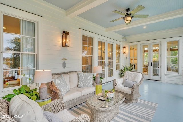 sunroom / solarium with french doors, beamed ceiling, and ceiling fan