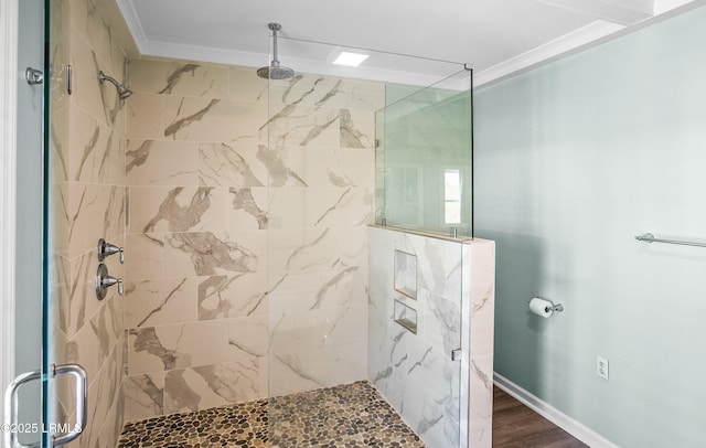 79 Lost Island Rd, Beaufort, SC 29907 - full bathroom featuring crown molding, a tile shower, and wood finished floors