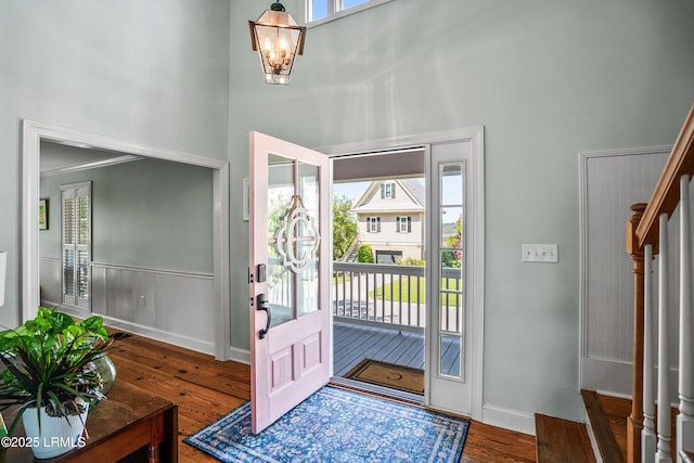 79 Lost Island Rd, Beaufort, SC 29907 - entrance foyer featuring baseboards, a towering ceiling, wood finished floors, and a healthy amount of sunlight