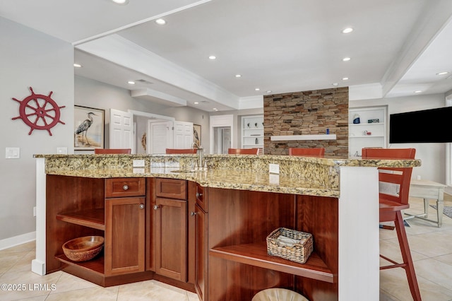 kitchen with ornamental molding, light tile patterned flooring, and open shelves