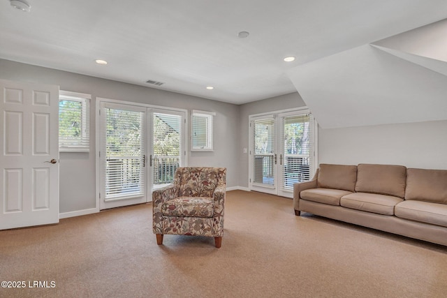 interior space featuring recessed lighting, baseboards, visible vents, and carpet flooring