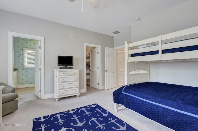 bedroom with carpet, visible vents, ceiling fan, and baseboards