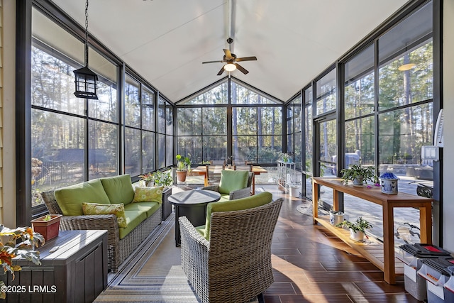 sunroom / solarium featuring vaulted ceiling and ceiling fan