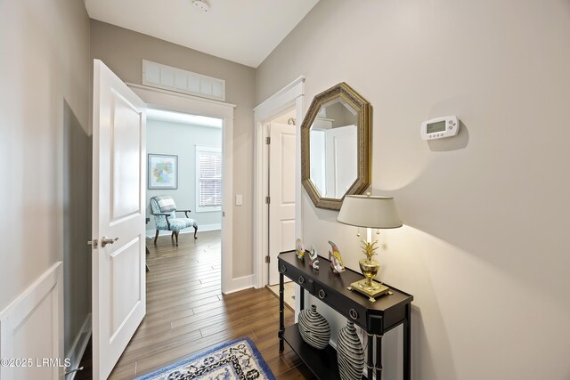 full bathroom featuring toilet, vanity, shower / bath combo with shower curtain, and tile patterned floors