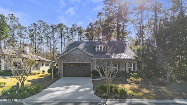 view of front of house with stone siding and concrete driveway