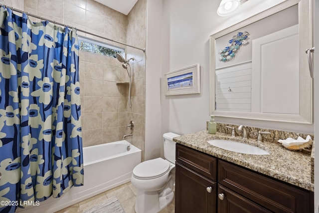 full bathroom with vanity, shower / tub combo, and toilet