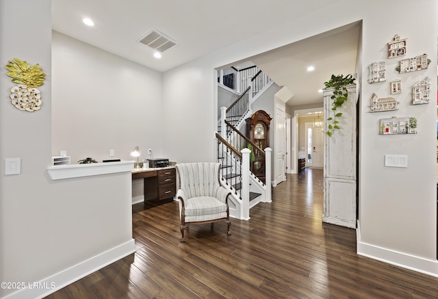 entrance foyer featuring dark hardwood / wood-style flooring