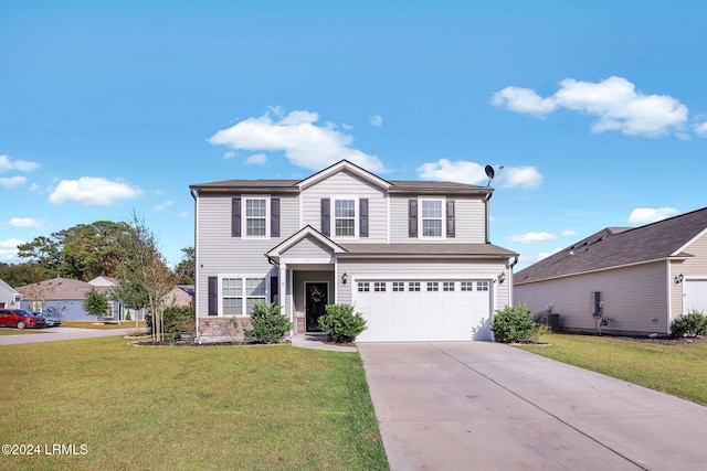 view of property with a garage, central AC, and a front lawn