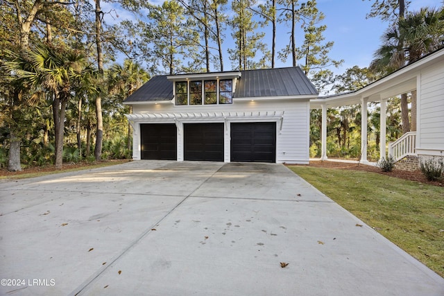 garage with a lawn