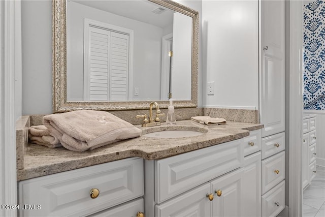 bathroom featuring vanity