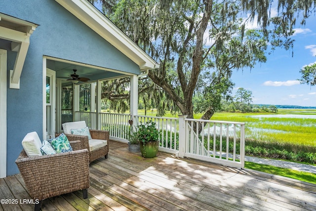 5 Petigru Dr, Beaufort, SC 29902 - wooden deck with ceiling fan and a water view