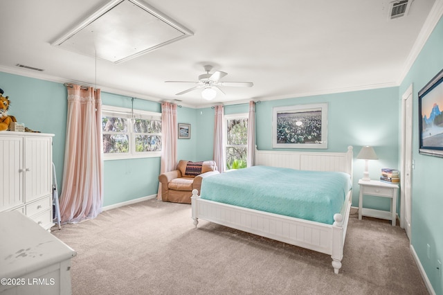 5 Petigru Dr, Beaufort, SC 29902 - carpeted bedroom with attic access, ornamental molding, and a ceiling fan