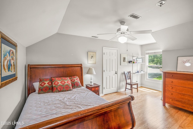 5 Petigru Dr, Beaufort, SC 29902 - bedroom featuring light wood-style flooring, vaulted ceiling, a closet, and ceiling fan