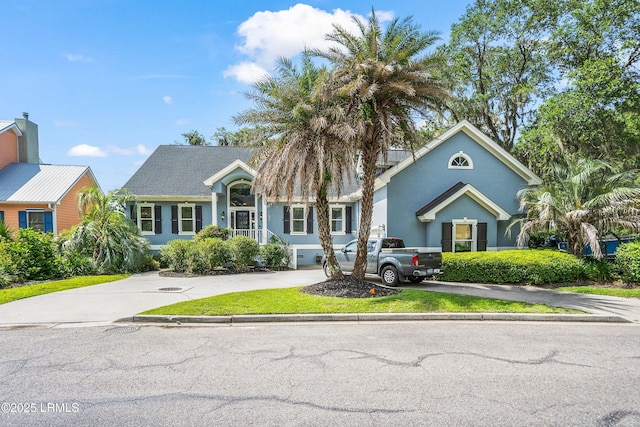 5 Petigru Dr, Beaufort, SC 29902 - view of front of house featuring driveway and stucco siding