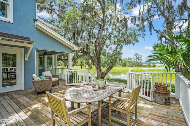 5 Petigru Dr, Beaufort, SC 29902 - wooden terrace featuring ceiling fan and outdoor dining area
