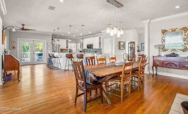 5 Petigru Dr, Beaufort, SC 29902 - dining area featuring ceiling fan, light wood-type flooring, recessed lighting, and ornamental molding