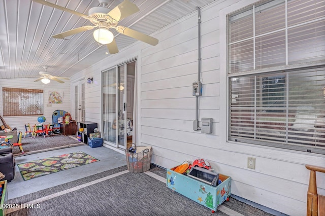 view of patio featuring a ceiling fan