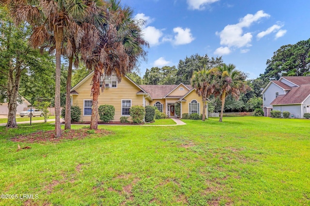 view of front of home with a front yard