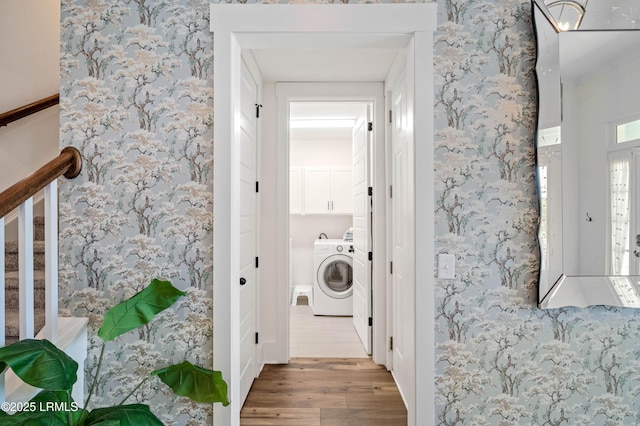 62 Anchor Bnd, Bluffton, SC 29910 - washroom with wallpapered walls, wood finished floors, and washer / clothes dryer