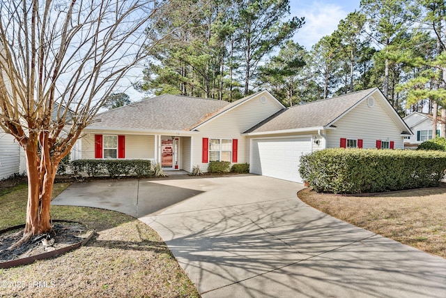 ranch-style home featuring a garage