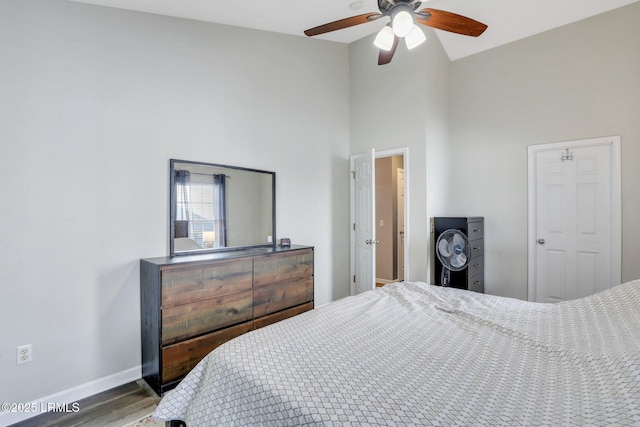 19 Grove Way, Bluffton, SC 29910 - bedroom with wood finished floors, baseboards, a towering ceiling, and a ceiling fan