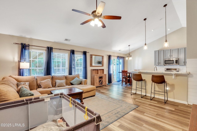 19 Grove Way, Bluffton, SC 29910 - living room featuring light wood-style floors, a ceiling fan, and high vaulted ceiling