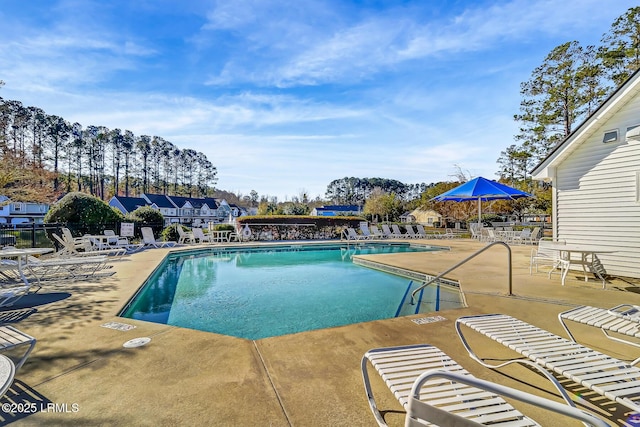 610 E Ave, Bluffton, SC 29910 - pool featuring a patio area and fence