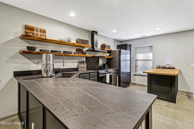 610 E Ave, Bluffton, SC 29910 - kitchen with open shelves, a sink, finished concrete floors, appliances with stainless steel finishes, and wall chimney range hood