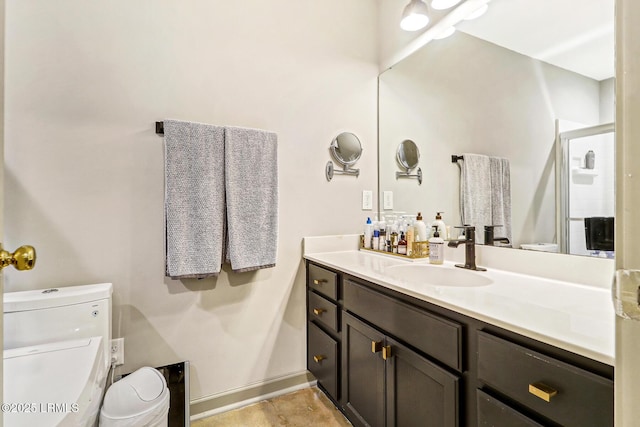 610 E Ave, Bluffton, SC 29910 - full bath featuring vanity, a shower stall, toilet, and baseboards