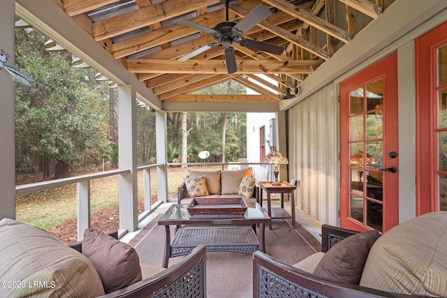 sunroom / solarium with vaulted ceiling with beams and ceiling fan