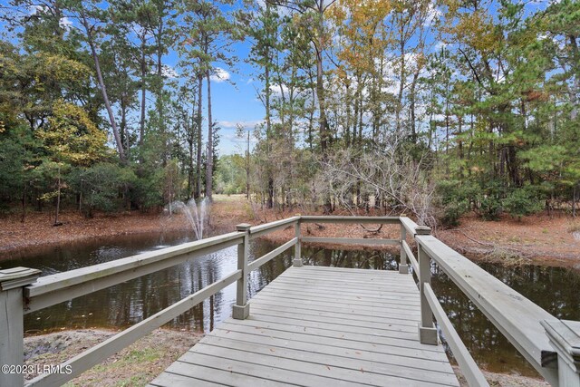 view of dock featuring a water view