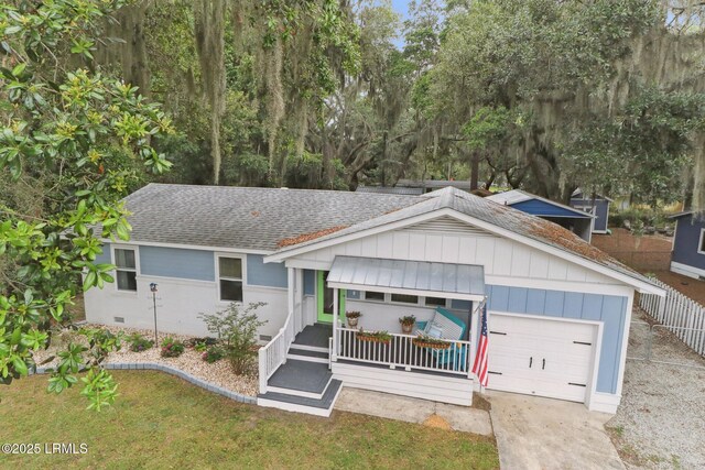 1617 Paris Ave W, Port Royal, SC 29935 - ranch-style home with a shingled roof, board and batten siding, driveway, a garage, and crawl space