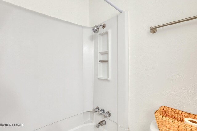 bathroom featuring tub / shower combination